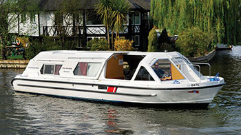 A sporty cruiser being used for a norfolk broads boat hire