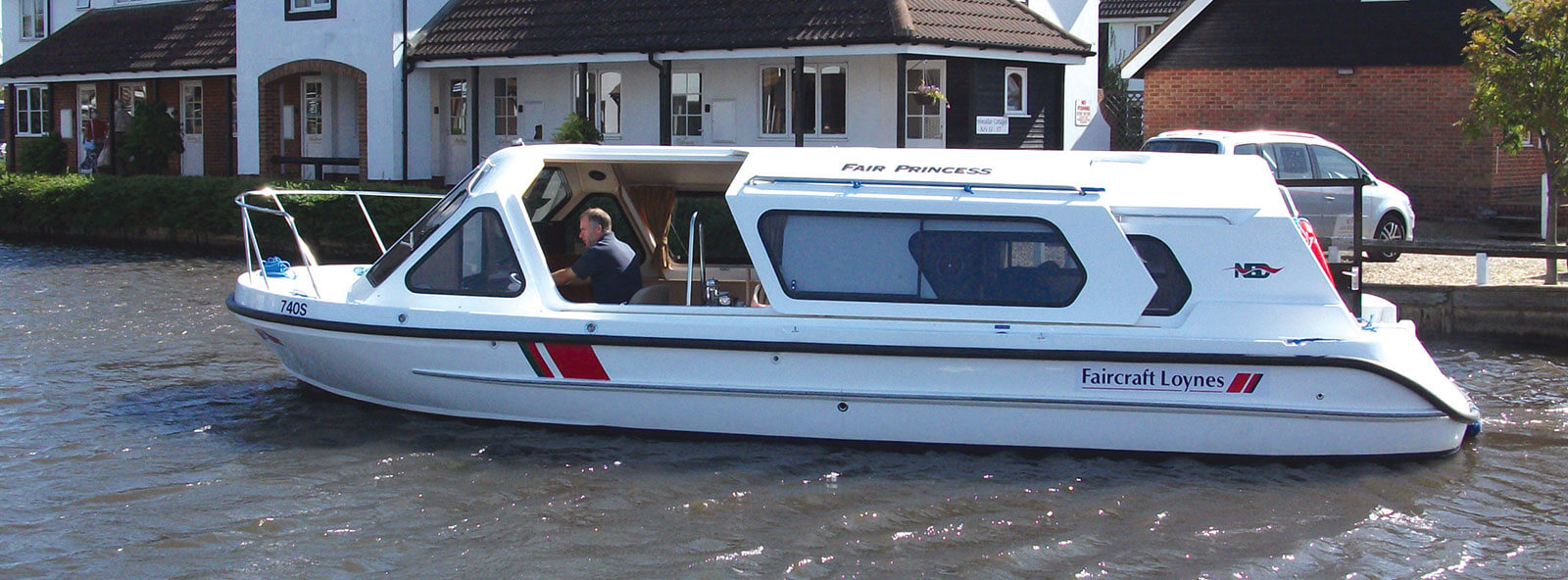 A sideways view of a cruiser for hire on the Broads